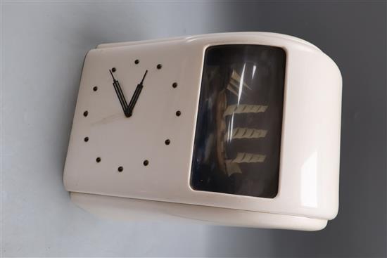 A Vitascope white bakelite ship automaton electric clock, height 30cm